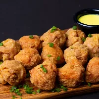 Piqueo Chicharrón de pollo x12